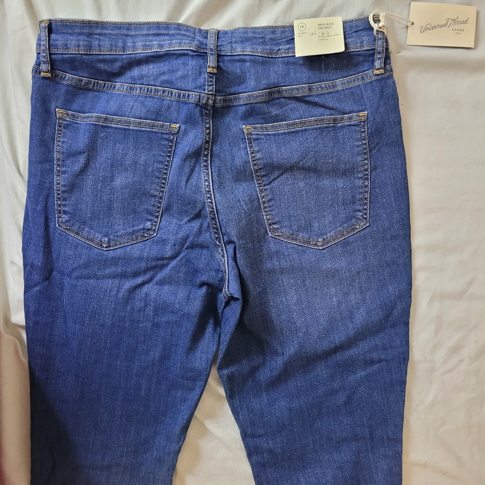 Universal Thread size 14 new jeans in dark blue. Mid rise jean